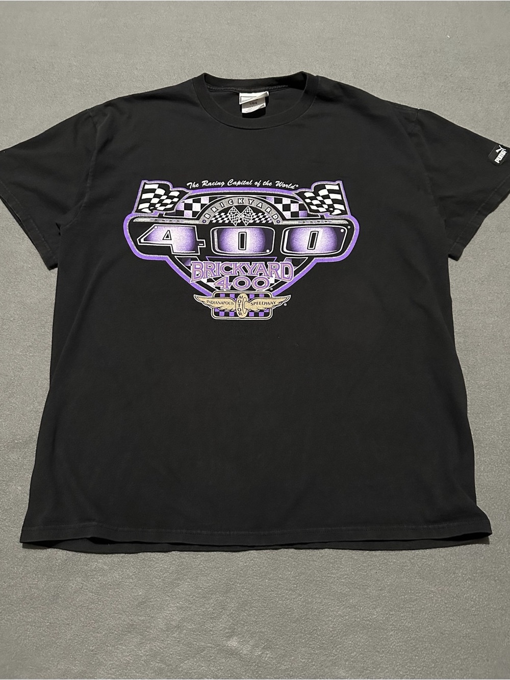Puma Brickyard 400 Graphic tee black with purple & white logo size L